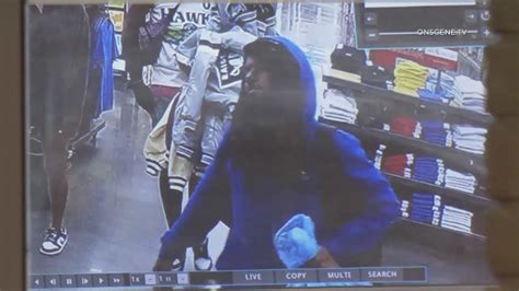 8 suspects caught on camera stealing thousands of dollars in merchandise from shoe store 